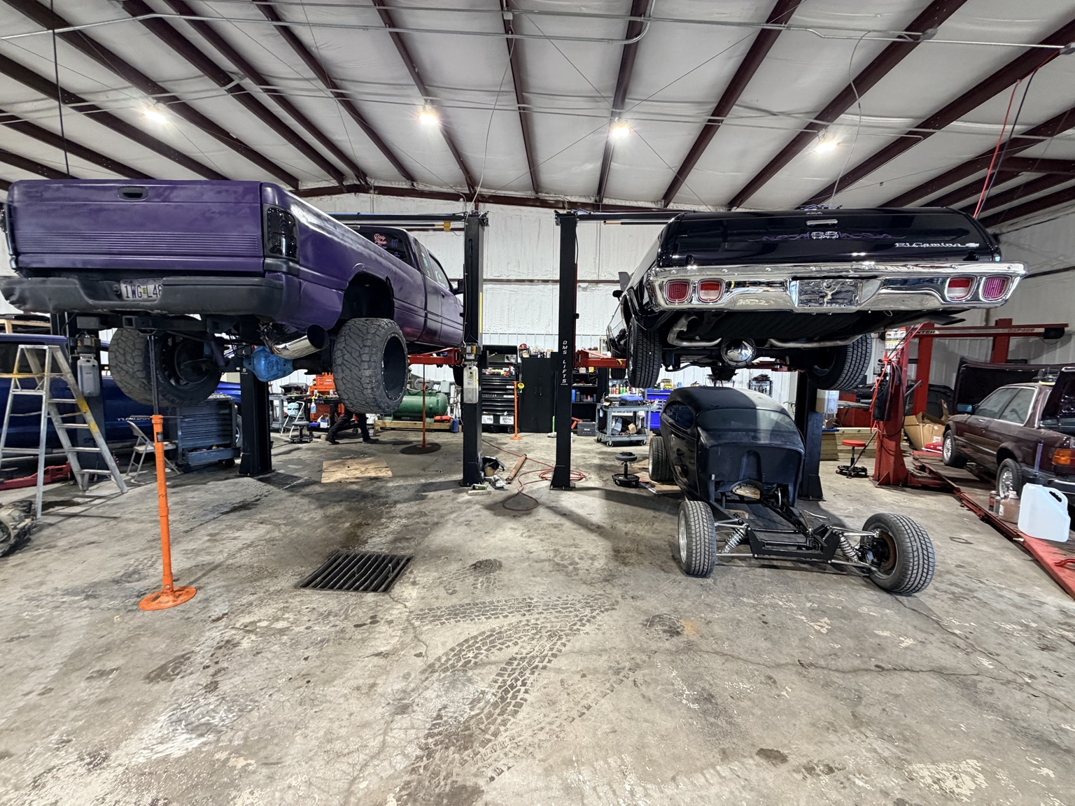 96 Dodge cummins 4x4 on lift nxt to a Elcamino SS also on lift